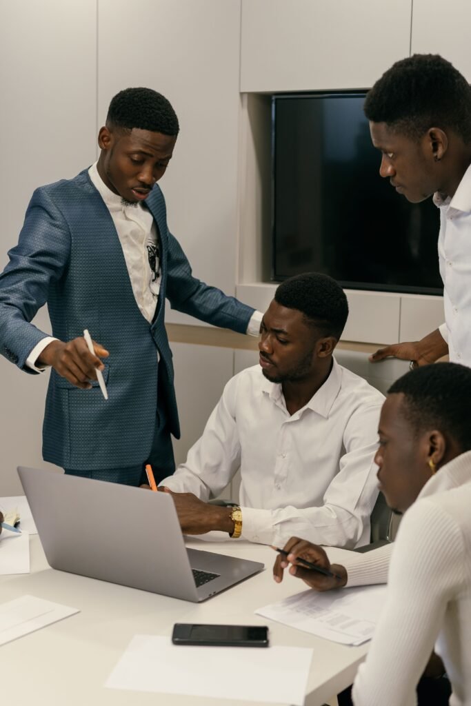 A diverse team engaged in a productive meeting in a modern office environment.